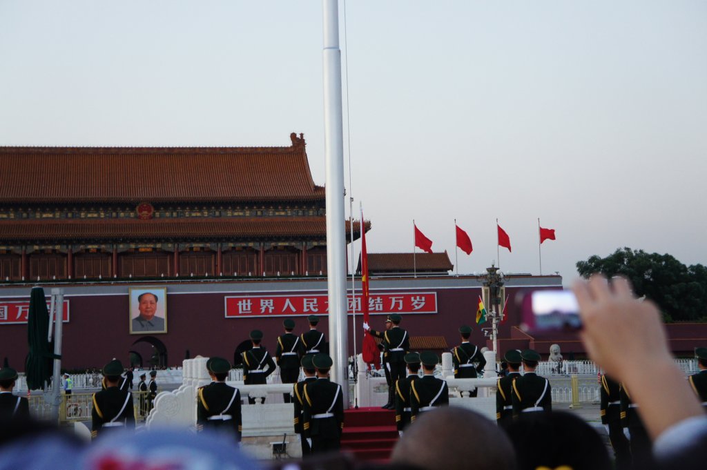beijingflagloweringceremonyatsunsettiananmensquare.jpg