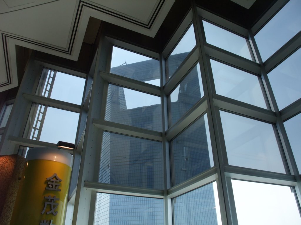 shanghaiworldfinancialcenterbottleopenerfrominsidejinmaotower.jpg